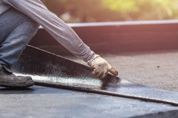 Professional Basement Waterproofing technician working in Underwood, IN